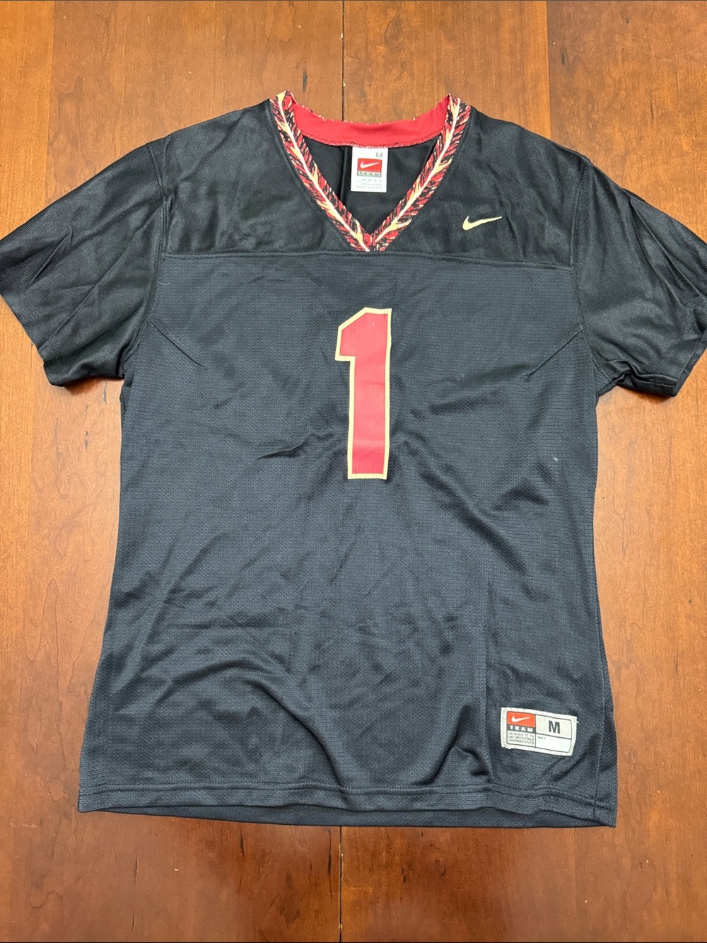 Nike women’s Black Florida state university jersey with 1